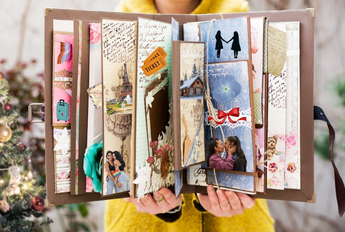 A big scrapbook being held by a person.