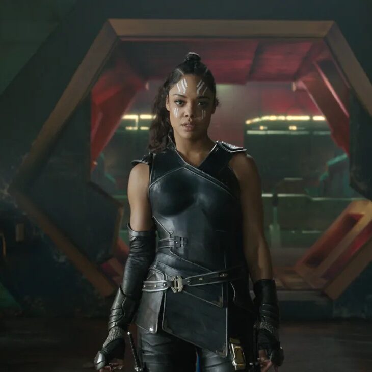 A female superhero in dark outfit.